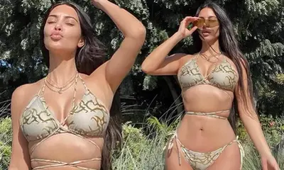 Kim Kardashian serves some serious curves as she basks in the sunshine working a Sєxy triangle ʙικιɴι amid ‘divorce’ from Kanye West