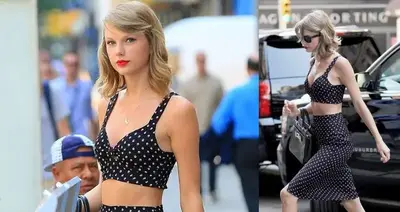 Spot on! Taylor Swift looks sensational as she flashes her trim midriff in polka dot bustier and matching skirt