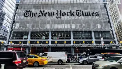 New York Times reporters and other staff stage 24-hour strike