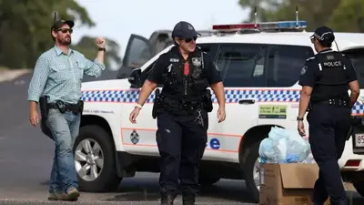 6 killed, including 2 officers, in Australian ambush, siege