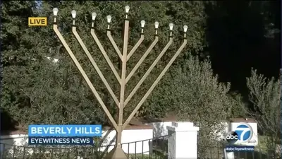 Man arrested for carving Nazi symbol onto family's menorah in Beverly Hills