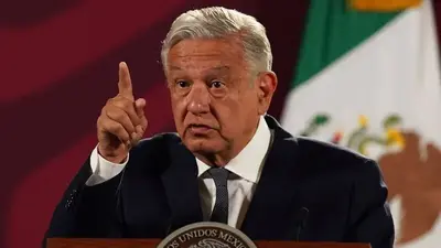 Mexico president asks residents to reject drug gang gifts