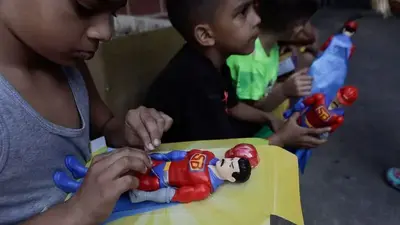 In Venezuela, Maduro-like Christmas toy stirs controversy