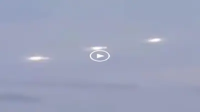 UFOs In A Row Filmed From Inside Of A Plane