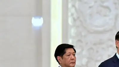 Philippine leader cites stable ties on visit to Beijing