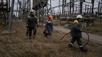 In Ukraine, power plant workers fight to save their 'child'