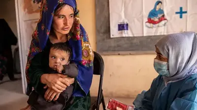 Afghan rulers urged to reverse ban on women aid workers