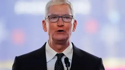 Apple CEO Tim Cook to take more than 40% pay cut