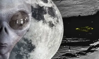 A huge 'Alien Ship' has been discovered lurking in the shadow of a crater on the Moon