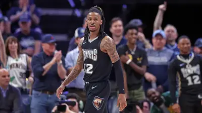 Colorado police open investigation into video of Ja Morant appearing to show off gun inside nightclub