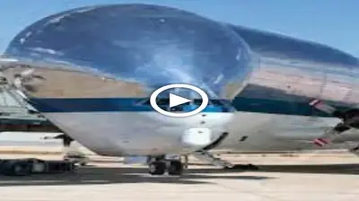 NASA Vehicle Loading Into Horribly Bulging Plane