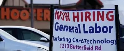 More Americans file for jobless claims; layoffs remain low
