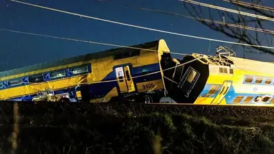 1 dead, dozens hurt as train derails from crash with construction equipment in Netherlands