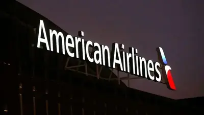 American Airlines, seeking new contract, vote to OK strike