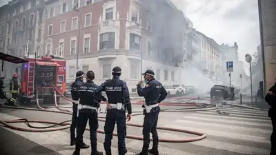 Vehicle explodes in central Milan, releasing plumes of smoke