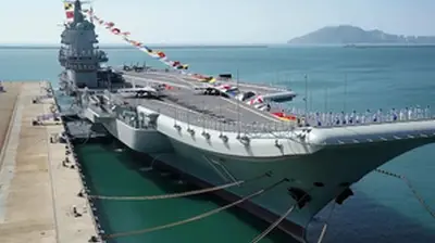 Taiwan says Chinese warships pass through Taiwan Strait as Beijing keeps up pressure on island