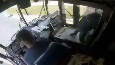 Dramatic footage shows shootout between bus driver, passenger