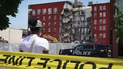 Partially collapsed apartment building set to be demolished in Iowa amid protests