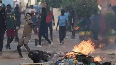 Senegal violence threatens country's stability as experts call on government to instill calm