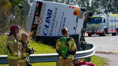 Driver charged after bus transporting wedding guests rolls over in Australia, killing 10