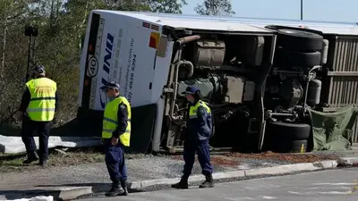 Australian bus driver released on bail after being charged over 10 passengers' deaths