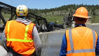 Train cars containing hot asphalt, molten sulfur still in Yellowstone River after derailment