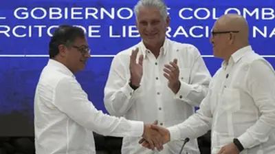 Colombian rebel group says it will stop attacks on military