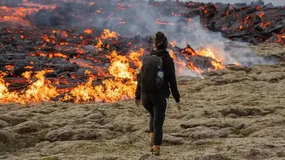 Iceland warns tourists to stay away from volcano erupting with lava and noxious gases