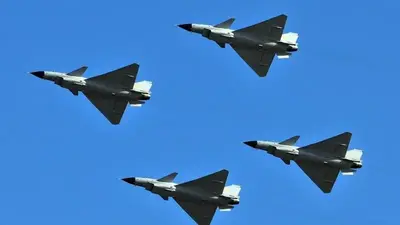 As Taiwan prepares for anti-invasion exercises, China sends dozens of warplanes toward the island