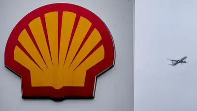 Shell earnings top $5 billion. But that's nearly half what it pulled in months ago