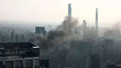 Crane partially collapses in midtown Manhattan