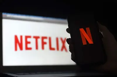 Netflix reworks Microsoft pact, lowers ad prices