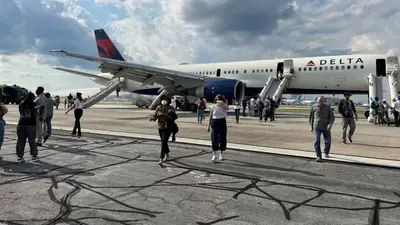 Tire on Delta flight pops while landing in Atlanta, 1 person injured, airline says
