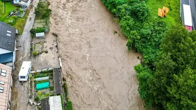 Officials urge people in Slovenia to stay home after torrential rain and flash kill at least 3