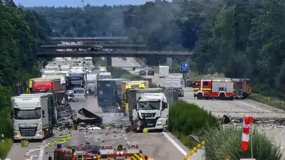 A multi-truck crash involving hazardous materials kills 2 on German highway