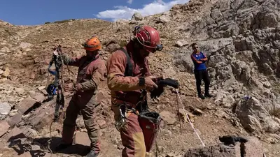 Trapped American caver's evacuation advances, passing camp 1,000 feet below surface