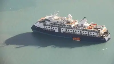 Luxury cruise ship runs aground with 206 passengers on board as rescue efforts underway