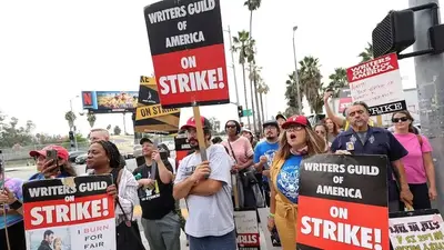Hollywood writers reach 'tentative' deal with studios, end monthslong strike
