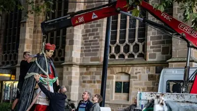 A statue of late cardinal accused of abuse removed from outside a German cathedral