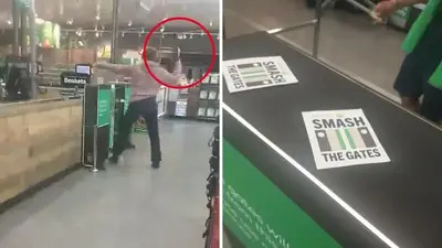 Shopper smashes Woolworths self-serve gates with hammer in act of rebellion