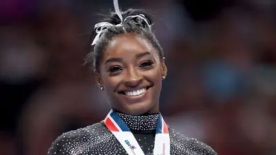Simone Biles addresses viral video of young Black gymnast being snubbed a medal