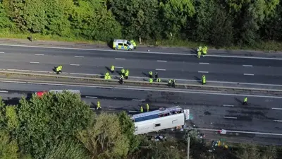 A bus carrying children overturns in northwest England, killing the driver and a 14-year-old girl