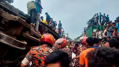 At least 12 killed and many injured when one train hits another in central Bangladesh