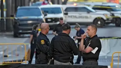 Shooting kills 2 and injures 18 victims in Florida street