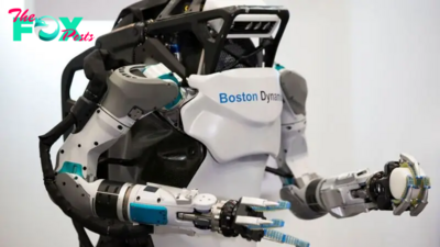 Forget making coffee — Boston Dynamics puts Atlas to work lifting heavy automotive struts in latest flex