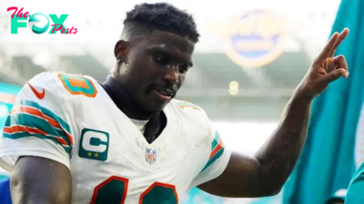 Who is Sophie Hall and why is she sueing Miami Dolphins wide receiver Tyreek Hill?
