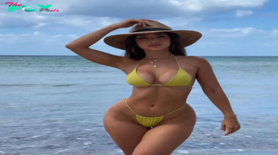 Dani Torres shows off her seductive curves in a yellow swimsuit at a Mexican beach