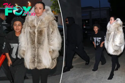 Kanye West’s wife Bianca Censori covers up in fur coat while out with rapper and North West