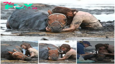 A young mother risked her life to stay with her beloved horse for more than 3 hours to save the animal after it became trapped in a sinking swamp.