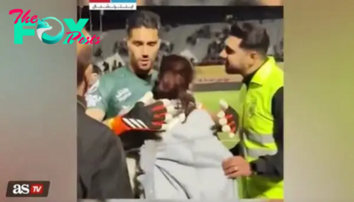 Iranian soccer player suspended and fined for hugging a woman